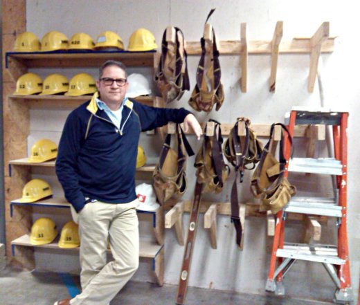 John Curtis, former educational specialist for the Middle College program, shows some of the equipment he and his students use in his new instructor position for OTC's construction department. Curtis worked as a general contractor for much of his adult career prior to working at OTC.