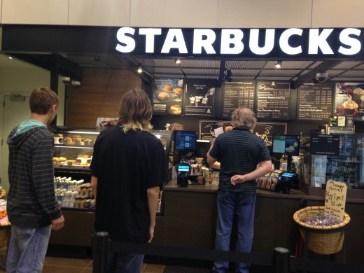 MC students Ryan Crutcher and Josh Goin wait in line to order at the new Starbucks. Both students do not make a habit of buying Starbucks but use it as treat for themselves once in a while. 
