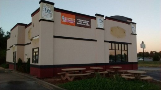 A "coming soon" sign hangs on the outside of the former Backyard Burgers location in South Springfield. According to Google, there were 7,677 Dunkin' Donuts retail locations around the country as of December 2013.