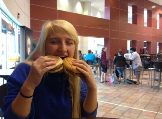 Middle College senior Essence Coleman tries both breakfast and lunch for her birthday Oct. 9. She said she is very happy that she can now choose to sleep in and still have the choice of breakfast items at McDonald's.