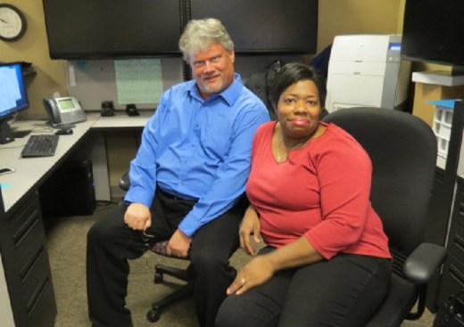 Adam Monsees (left) and Charla Hampton (right) demonstrate their laid-back style in the reception area of the Middle College office. Students enjoy hanging out  in the office between classes because of the welcoming, conversational atmosphere Monsees and Hampton create.