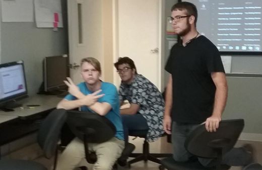 As pictured from left to right:  Middle College Robotics Club members Ethan Szalla, Spencer Montgomery, and Noah Montgomery plan this year's robot at their meeting in Mr. Meyers’ room last Tuesday. Robotics Club now has seven members after Thursday’s assembly.