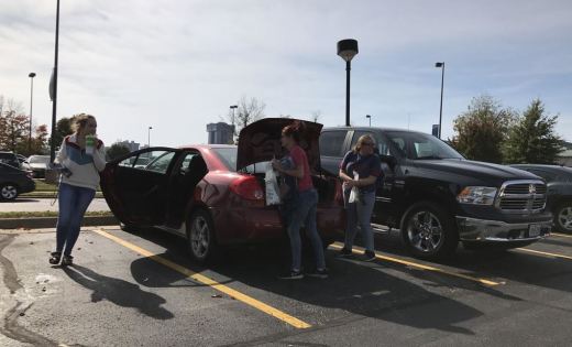 Students Kendra Hopkins, Samantha Thomason, and Helen Drury gather their stuff as they head for their last class Oct. 28. OTC Springfield  has 10 distinct parking lots distributed evenly around campus.